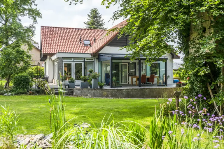 Stylish Pigato veranda with integrated gutter options by Designer Verandas